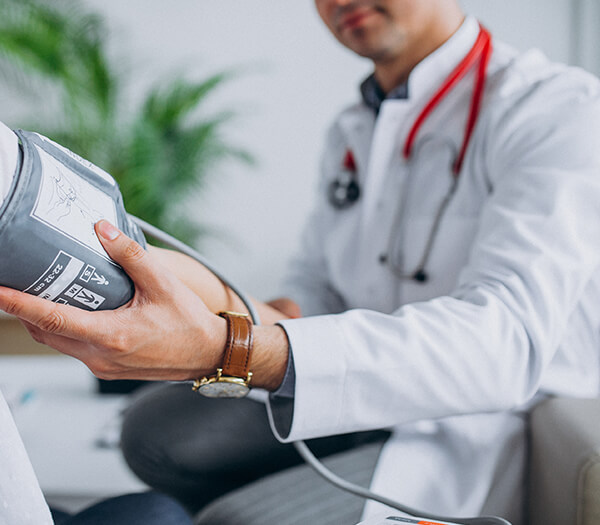 Orthopedic specialist examining patient's joint mobility