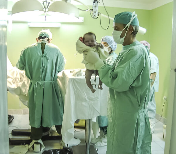 Pediatrician providing care to young patient